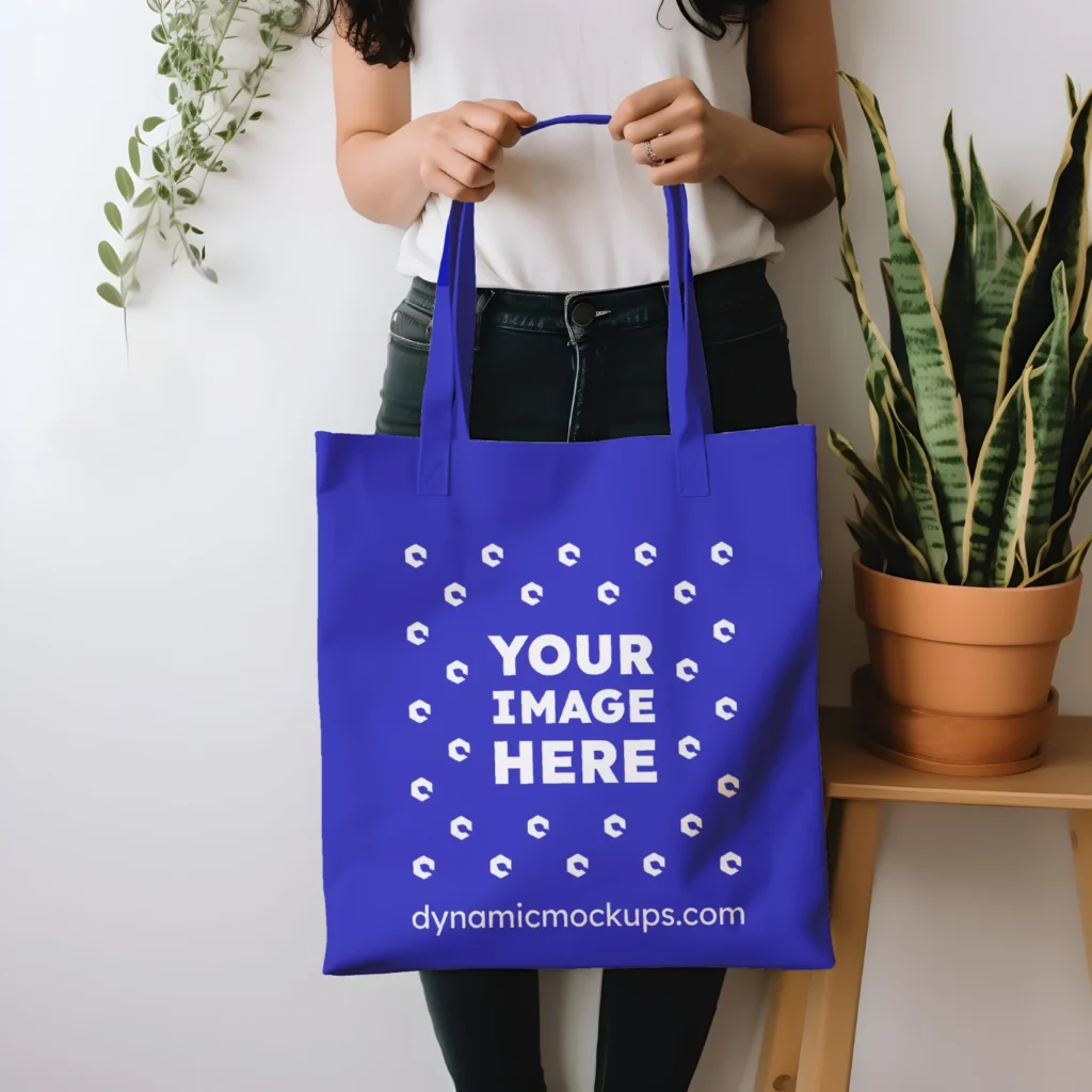 Woman Holding Blue Tote Bag Mockup Front View Template