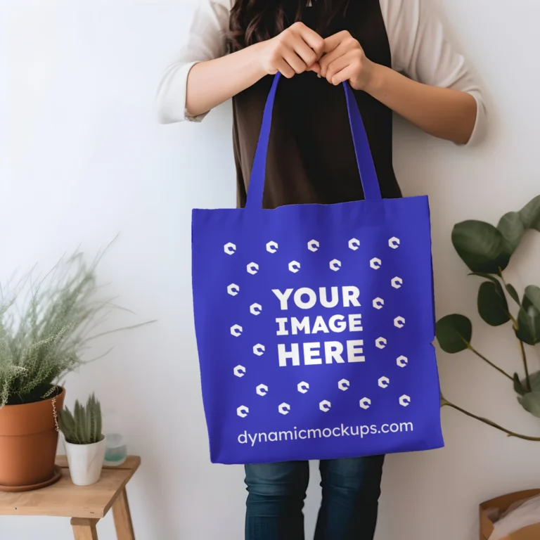 Woman Holding Blue Tote Bag Mockup Front View Template