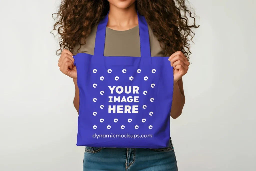 Woman Holding Blue Tote Bag Mockup Front View Template