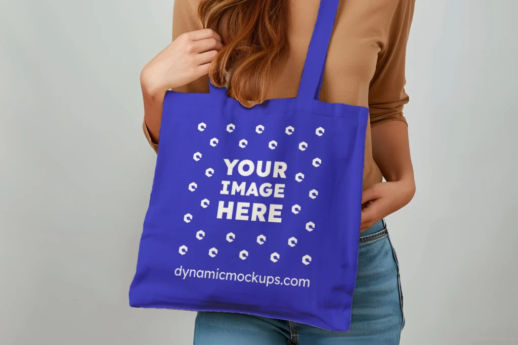 Woman Holding Blue Tote Bag Mockup Front View Template