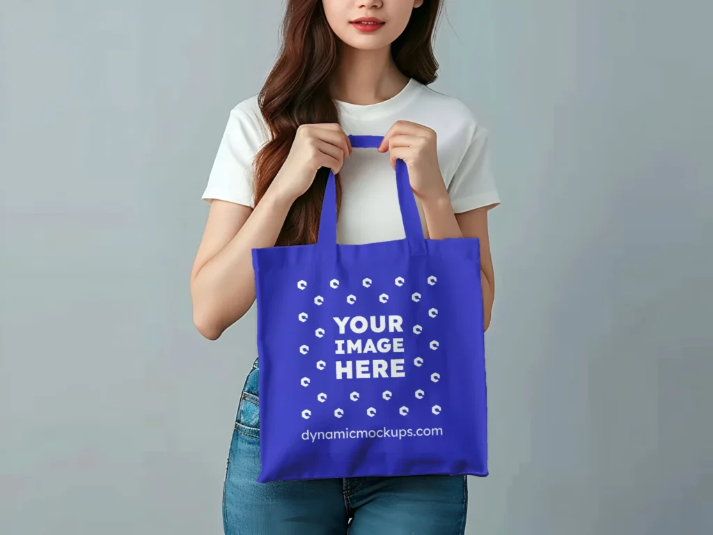 Woman Holding Blue Tote Bag Mockup Front View Template