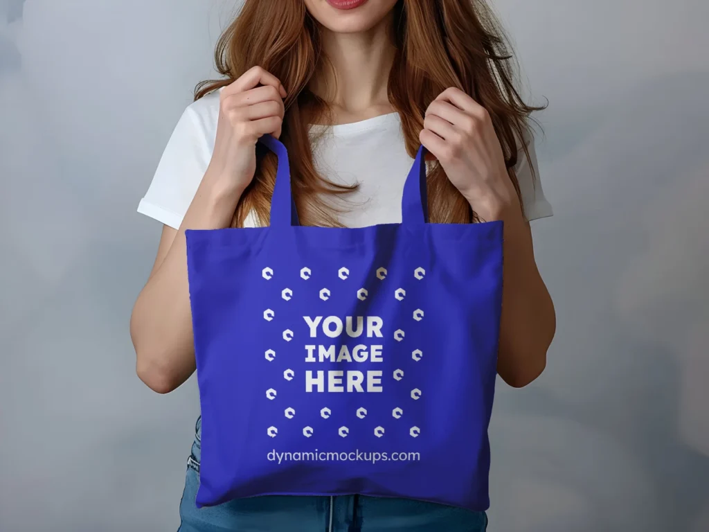 Woman Holding Blue Tote Bag Mockup Front View Template