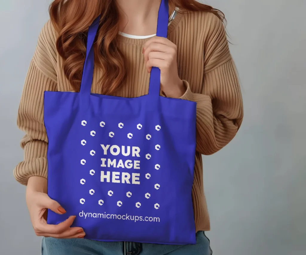 Woman Holding Blue Tote Bag Mockup Front View Template