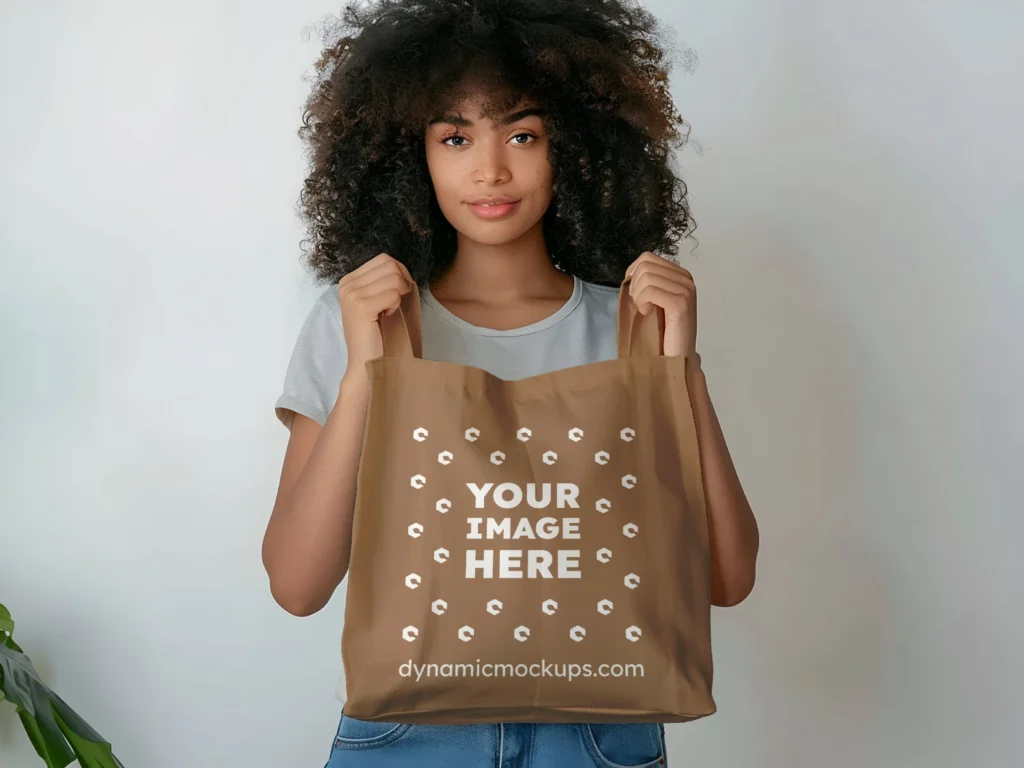 Woman Holding Brown Tote Bag Mockup Front View Template