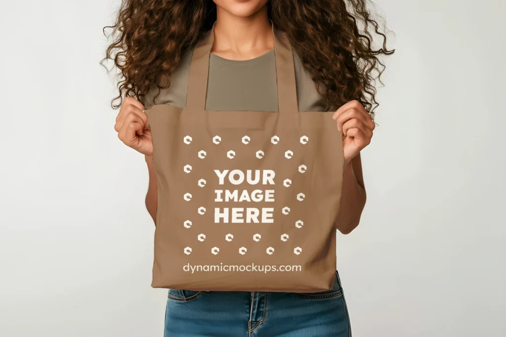 Woman Holding Brown Tote Bag Mockup Front View Template