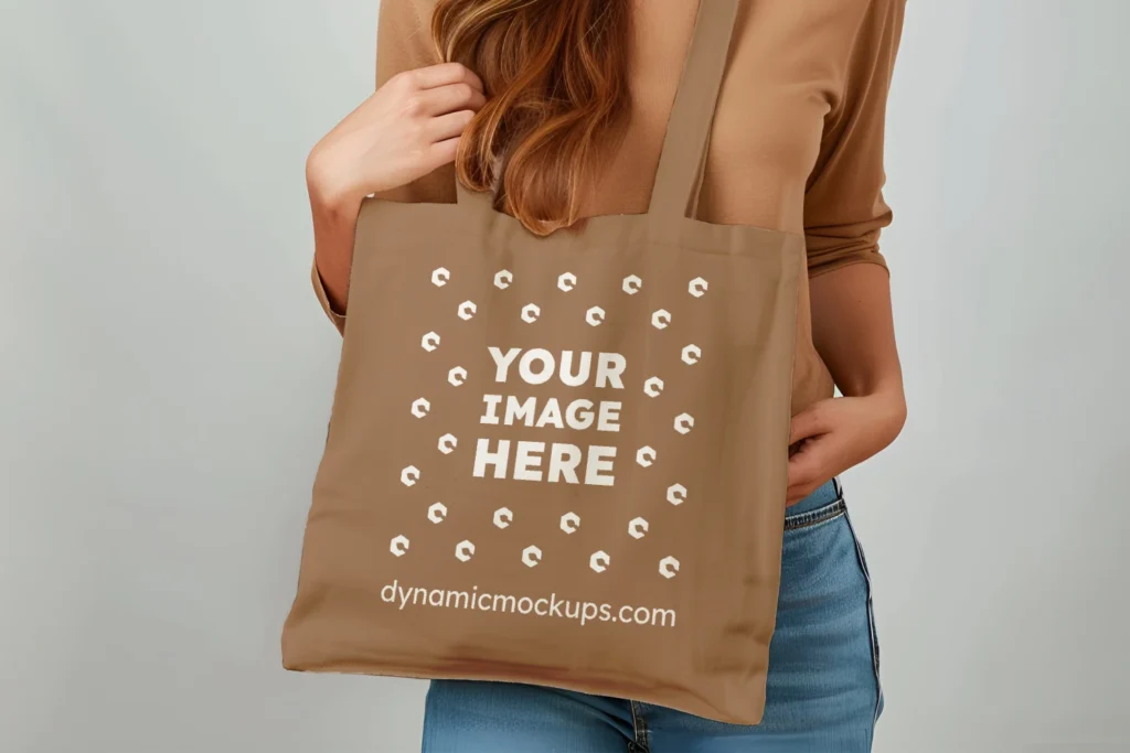 Woman Holding Brown Tote Bag Mockup Front View Template