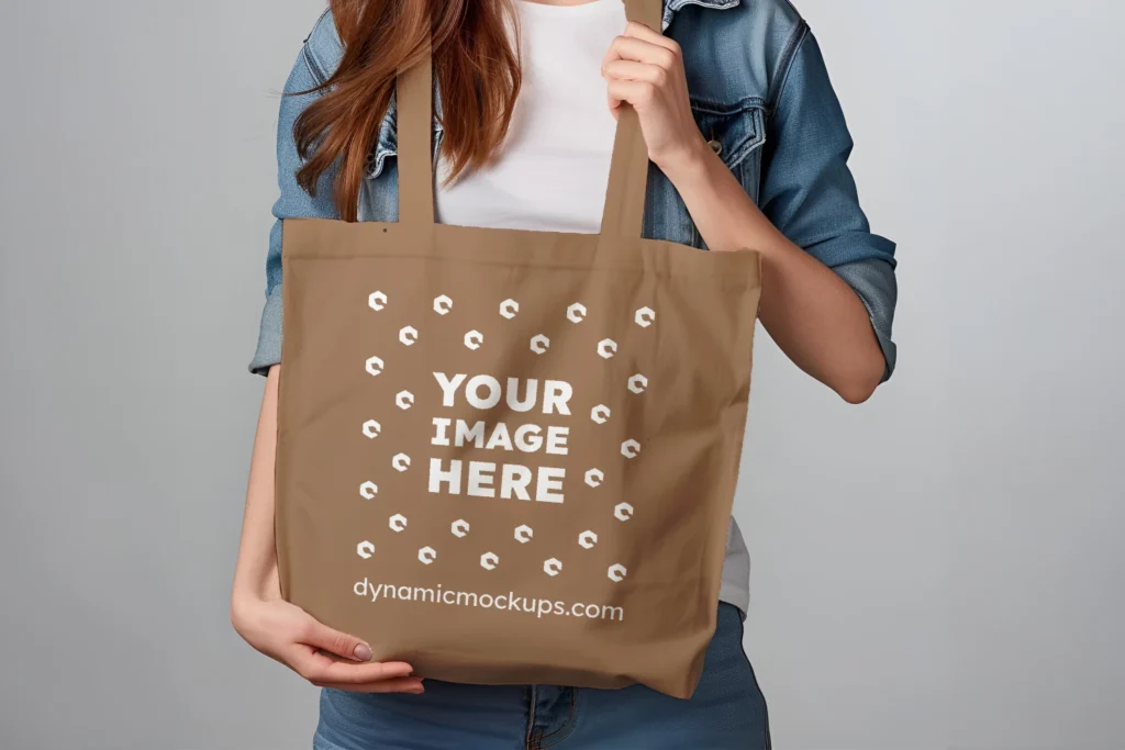 Woman Holding Brown Tote Bag Mockup Front View Template