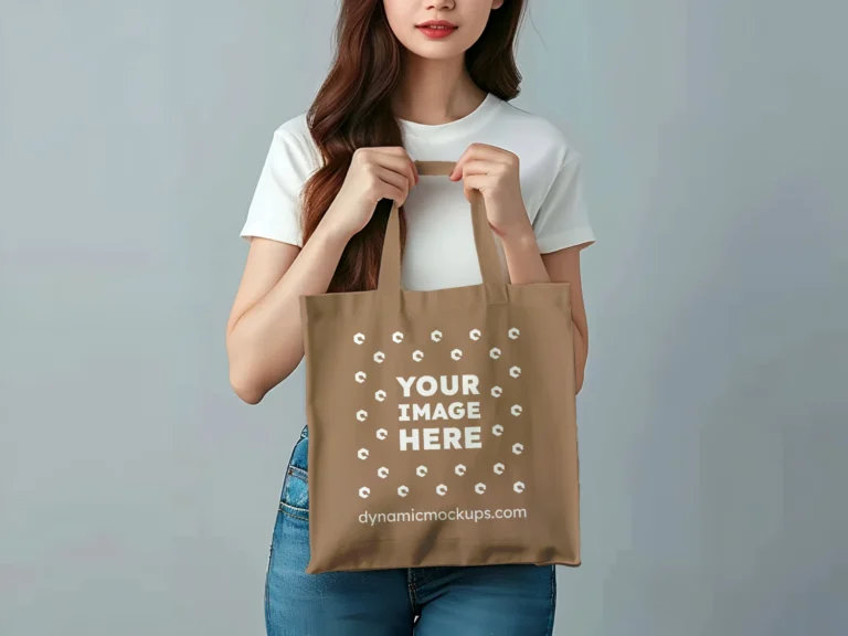 Woman Holding Brown Tote Bag Mockup Front View Template