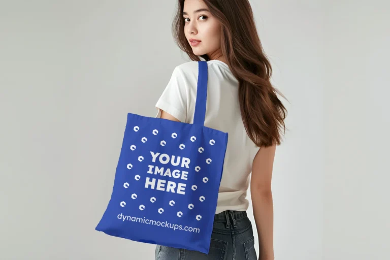 Woman Holding Dark Blue Tote Bag Mockup Back View Template