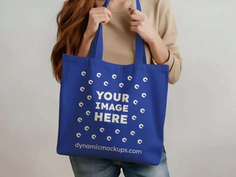 Woman Holding Dark Blue Tote Bag Mockup Front View Template