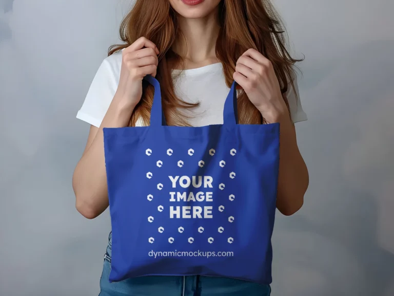 Woman Holding Dark Blue Tote Bag Mockup Front View Template