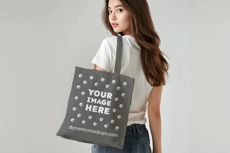 Woman Holding Dark Gray Tote Bag Mockup Back View Template