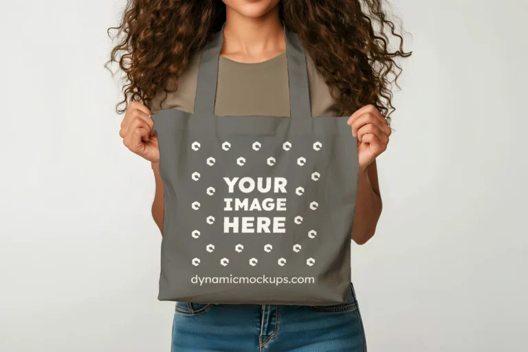 Woman Holding Dark Gray Tote Bag Mockup Front View Template