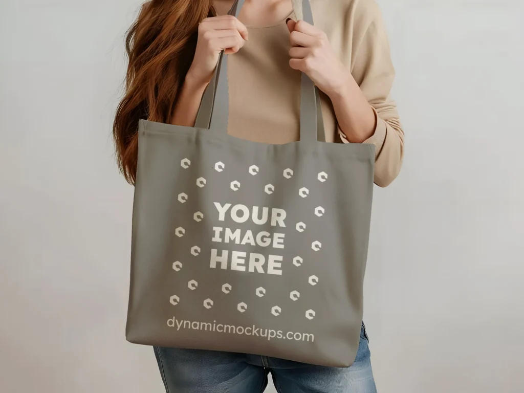 Woman Holding Gray Tote Bag Mockup Front View Template