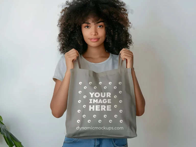 Woman Holding Gray Tote Bag Mockup Front View Template