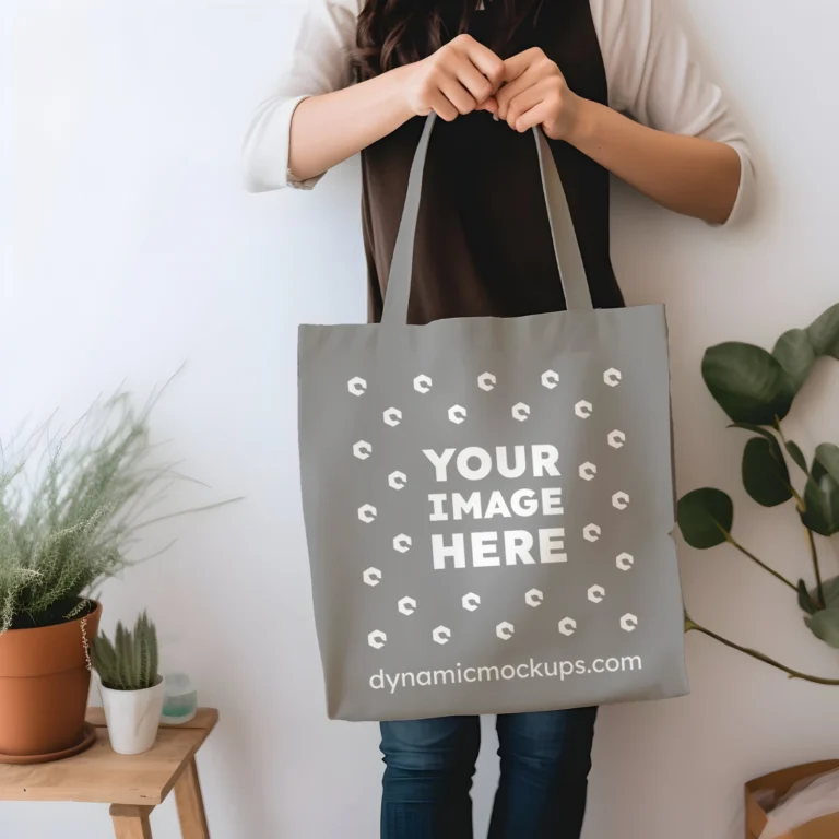 Woman Holding Gray Tote Bag Mockup Front View Template