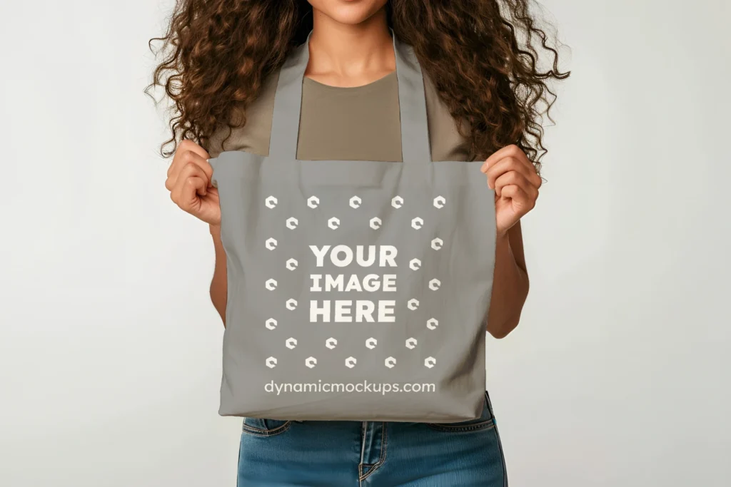 Woman Holding Gray Tote Bag Mockup Front View Template