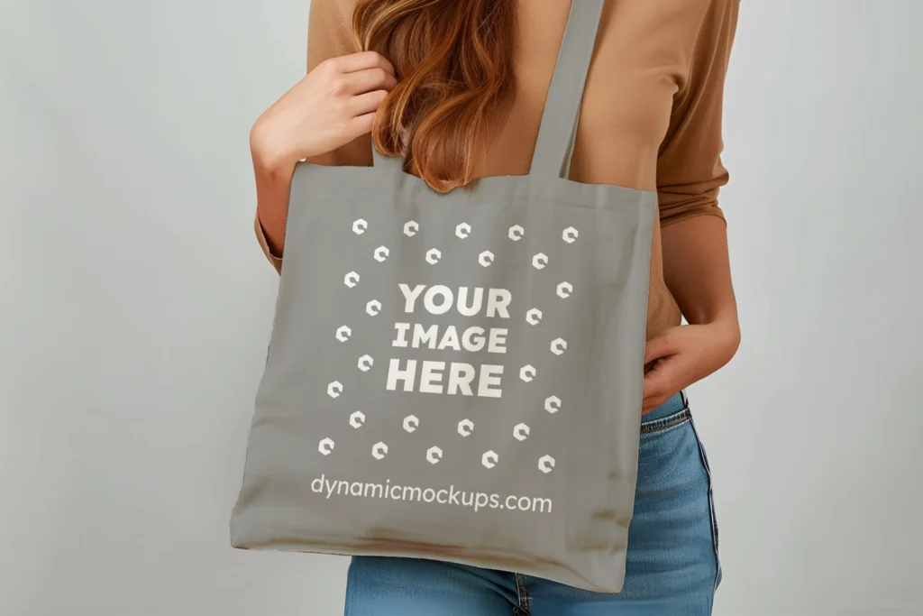 Woman Holding Gray Tote Bag Mockup Front View Template