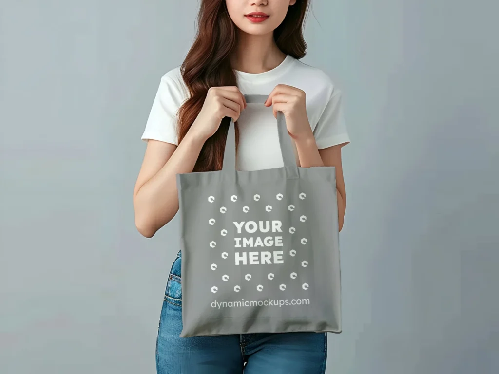 Woman Holding Gray Tote Bag Mockup Front View Template