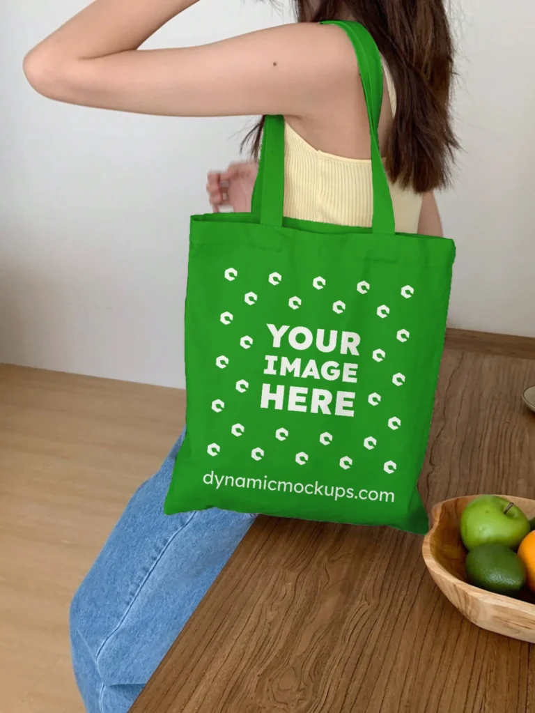 Woman Holding Green Tote Bag Mockup Side View Template