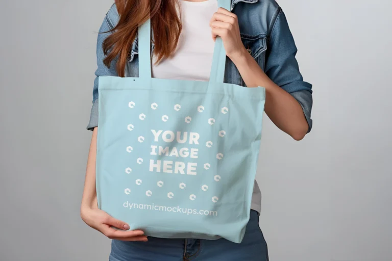 Woman Holding Light Blue Tote Bag Mockup Front View Template