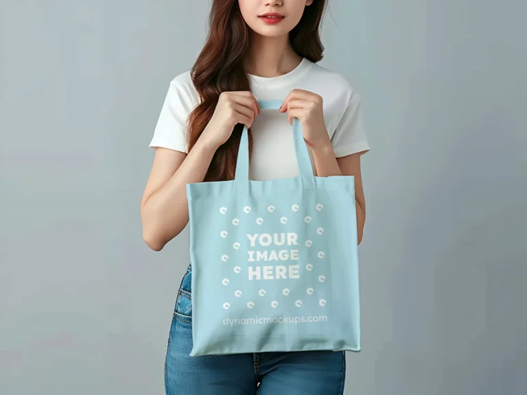 Woman Holding Light Blue Tote Bag Mockup Front View Template