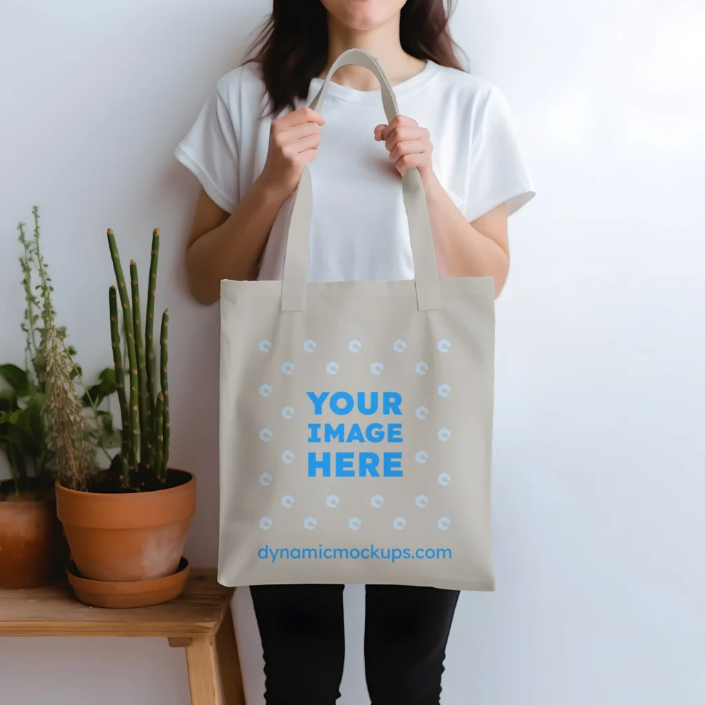 Woman Holding Light Gray Tote Bag Mockup Front View Template