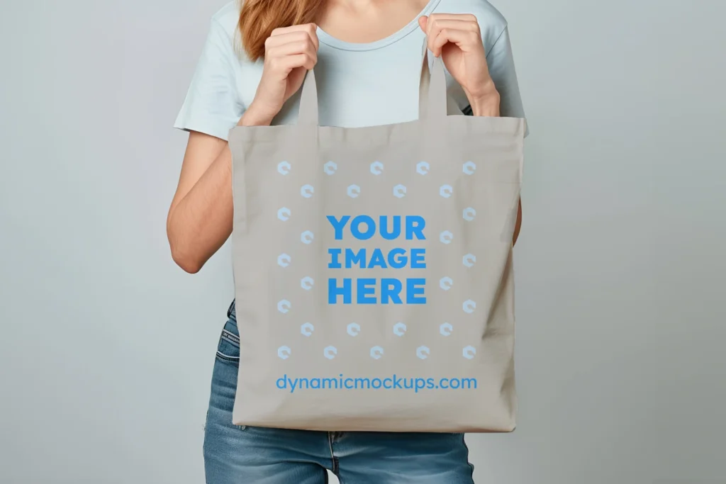 Woman Holding Light Gray Tote Bag Mockup Front View Template