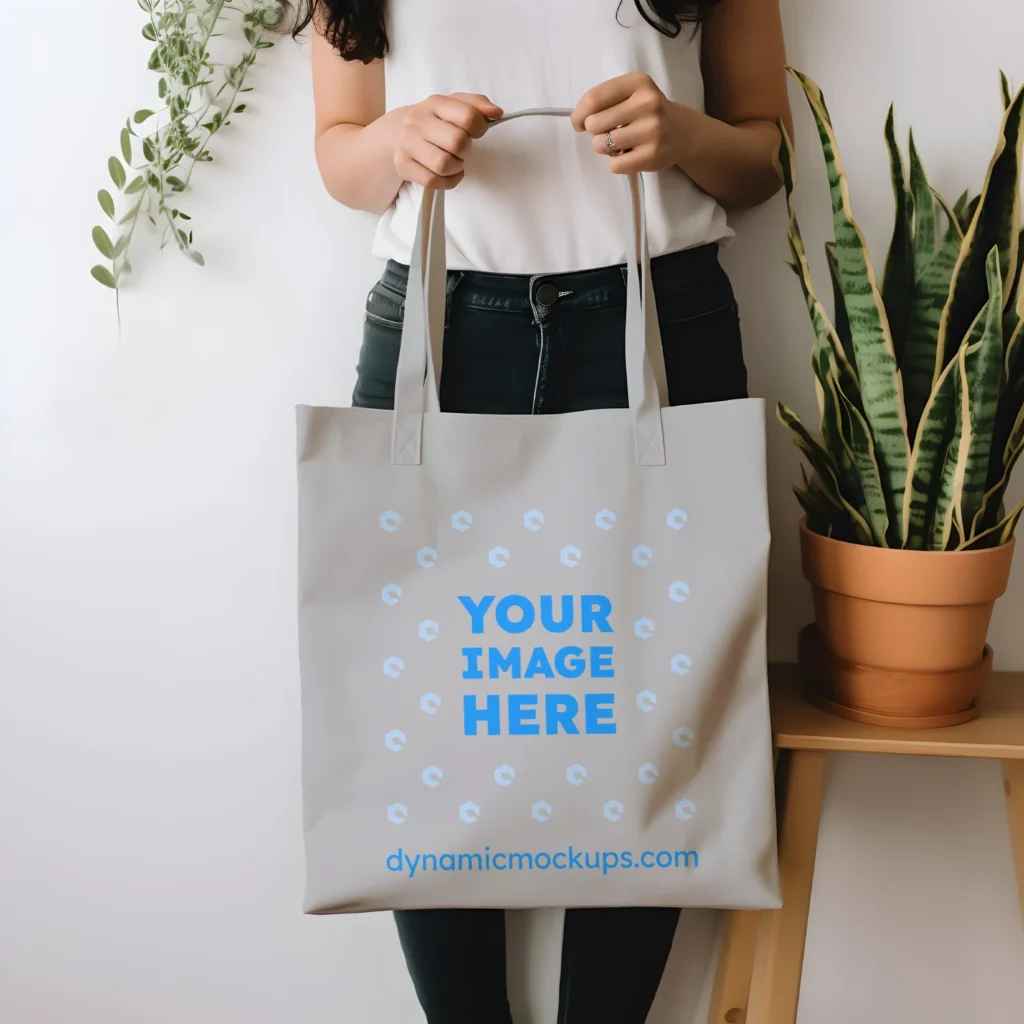 Woman Holding Light Gray Tote Bag Mockup Front View Template