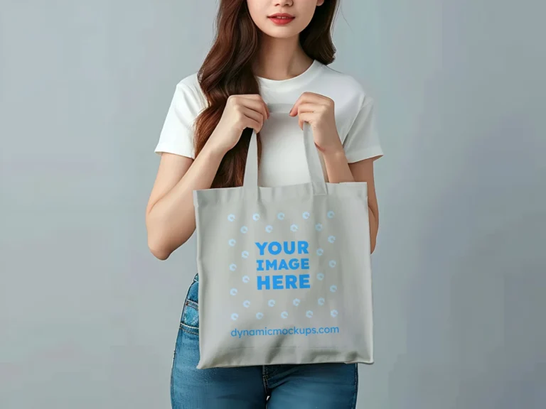 Woman Holding Light Gray Tote Bag Mockup Front View Template