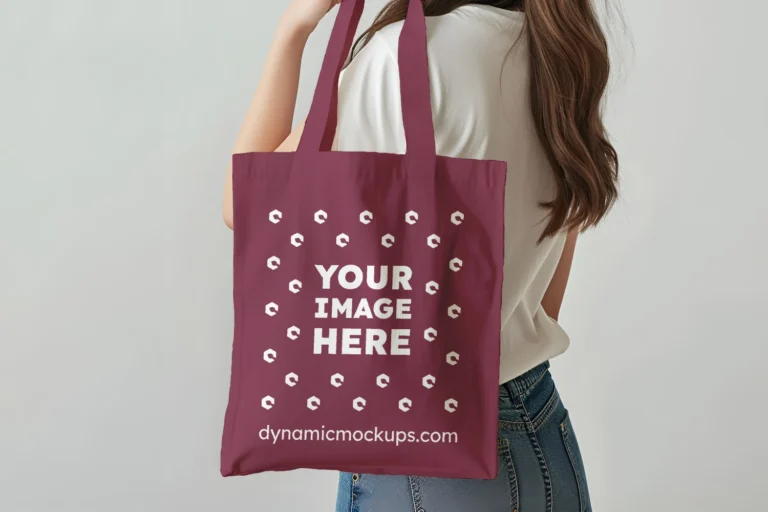 Woman Holding Maroon Tote Bag Mockup Side View Template