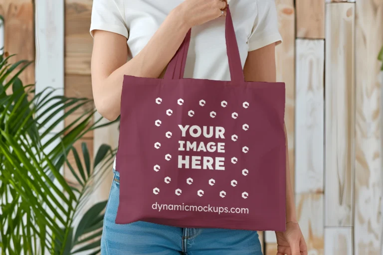 Woman Holding Maroon Tote Bag Mockup Front View Template