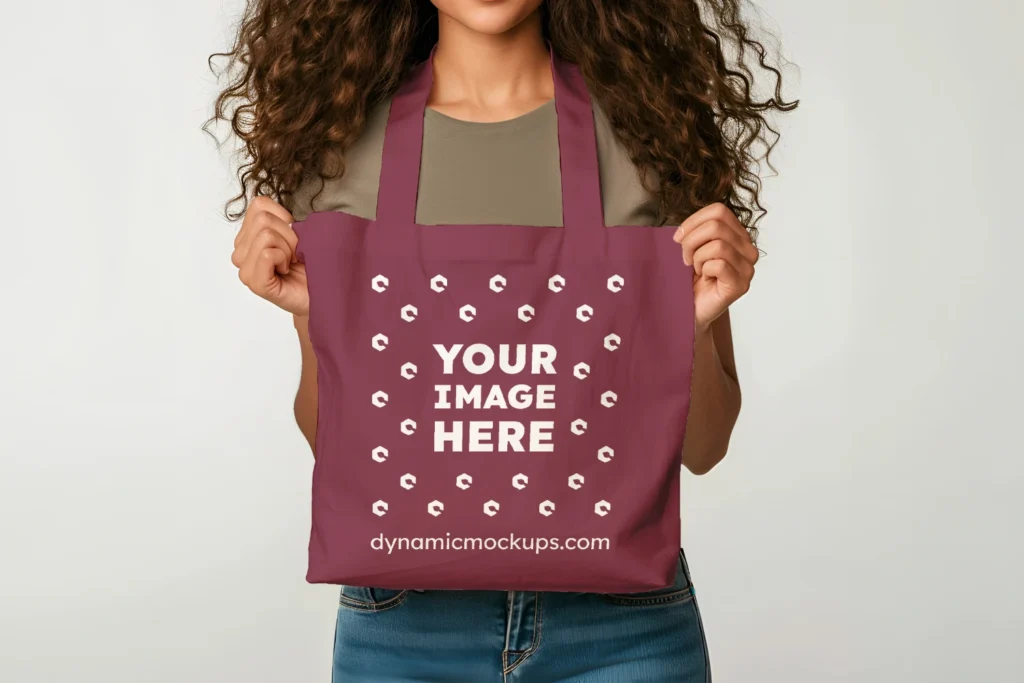 Woman Holding Maroon Tote Bag Mockup Front View Template