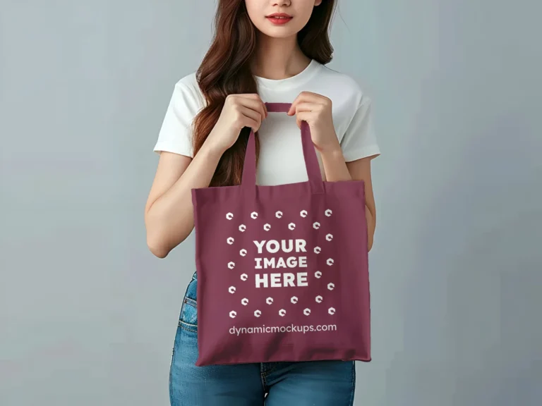 Woman Holding Maroon Tote Bag Mockup Front View Template