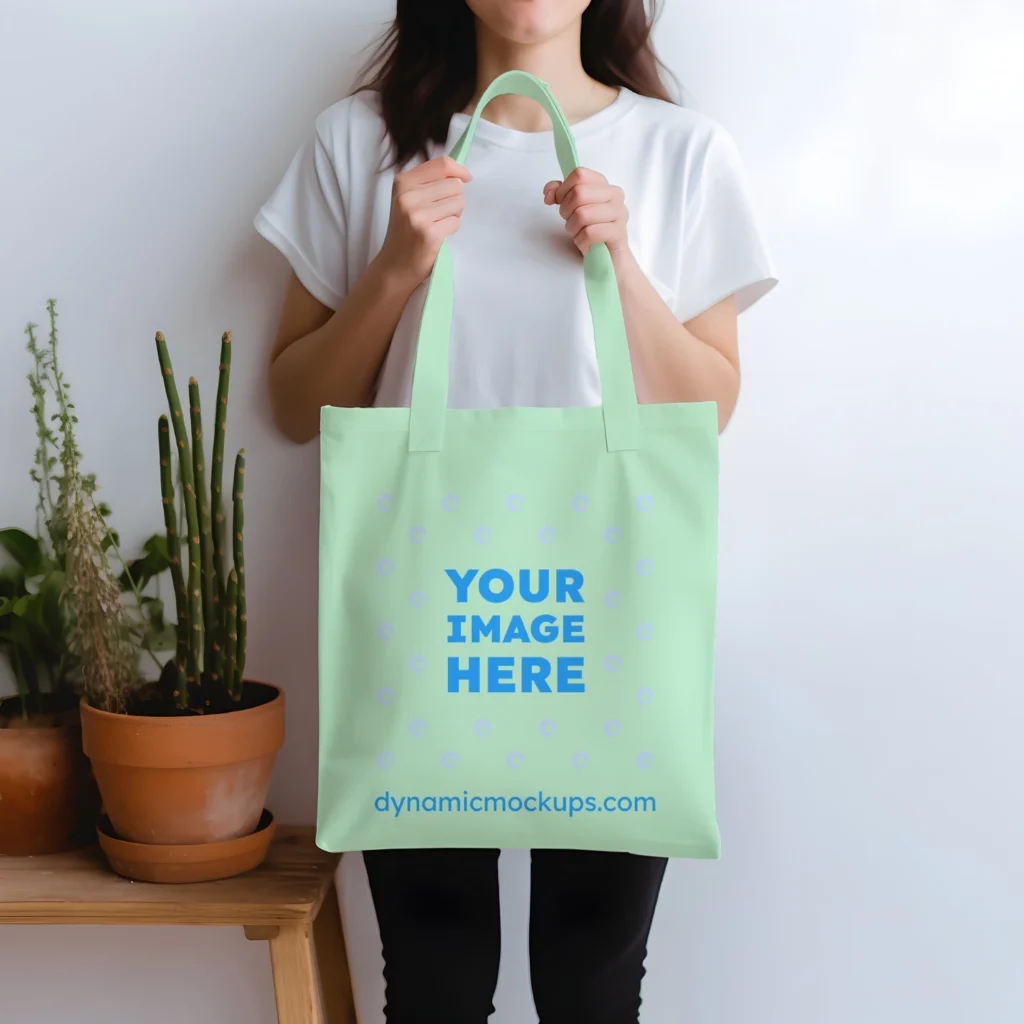 Woman Holding Mint Tote Bag Mockup Front View Template