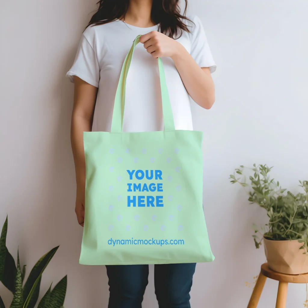 Woman Holding Mint Tote Bag Mockup Front View Template