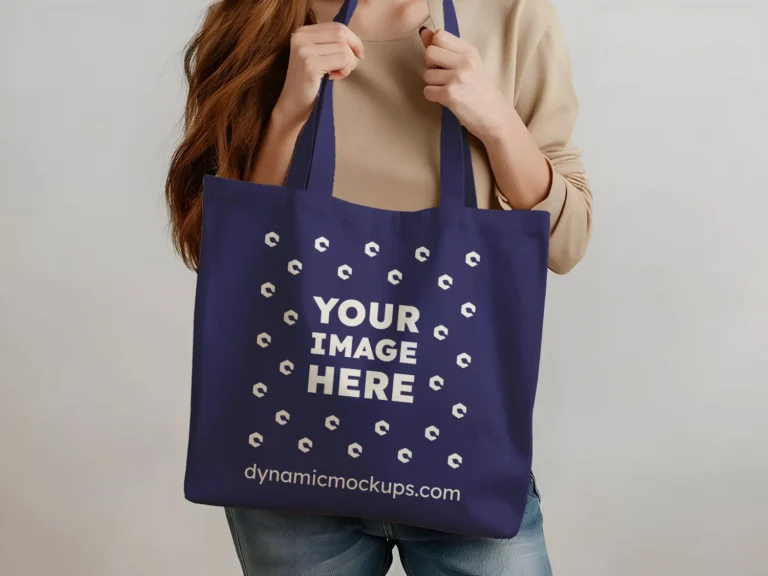 Woman Holding Navy Blue Tote Bag Mockup Front View Template