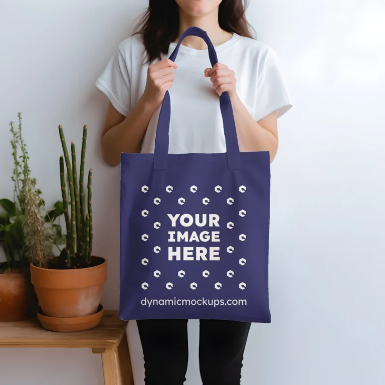 Woman Holding Navy Blue Tote Bag Mockup Front View Template