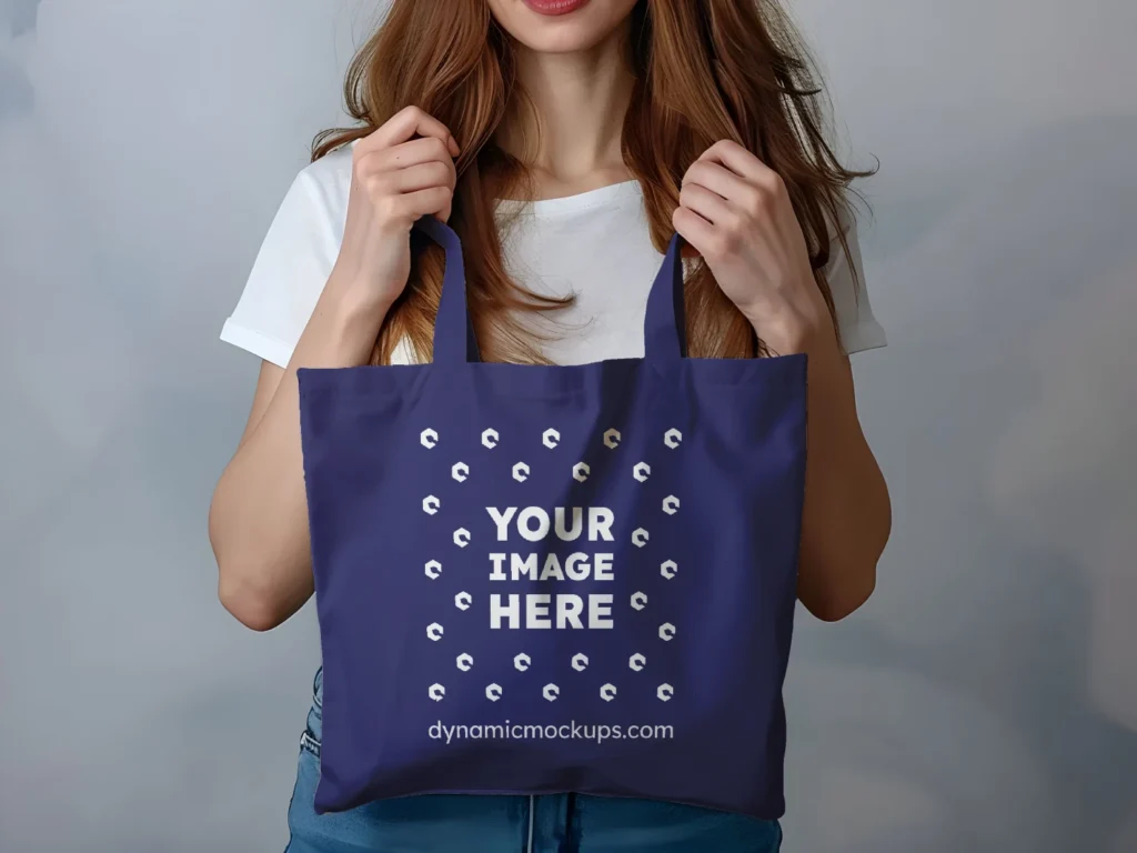 Woman Holding Navy Blue Tote Bag Mockup Front View Template