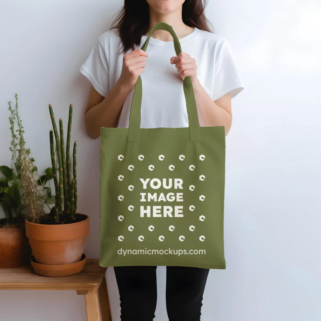 Woman Holding Olive Green Tote Bag Mockup Front View Template