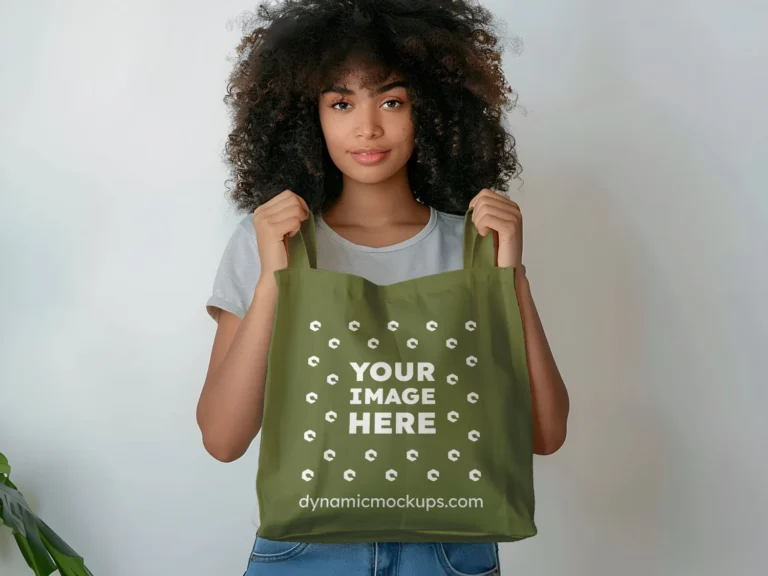 Woman Holding Olive Green Tote Bag Mockup Front View Template