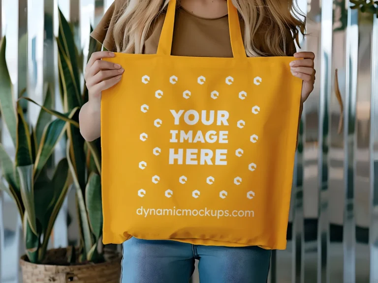 Woman Holding Orange Tote Bag Mockup Front View Template