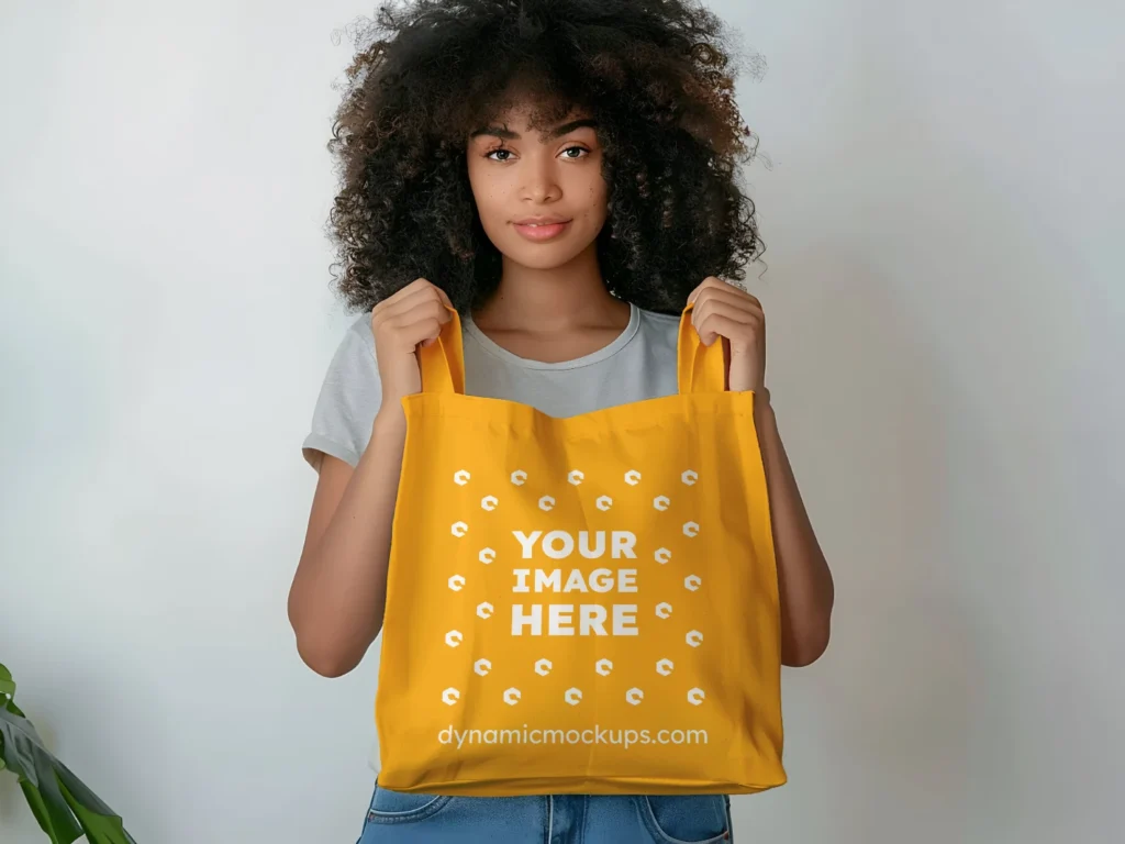 Woman Holding Orange Tote Bag Mockup Front View Template