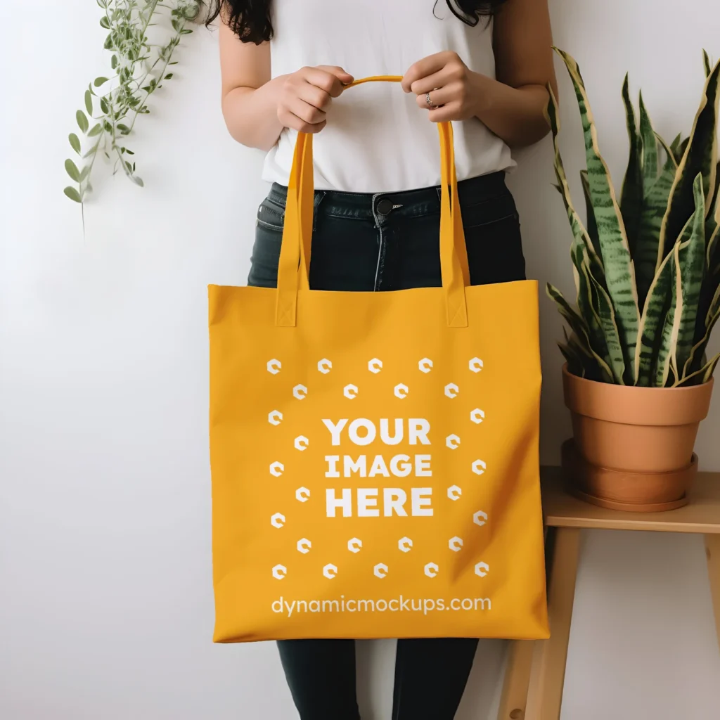 Woman Holding Orange Tote Bag Mockup Front View Template