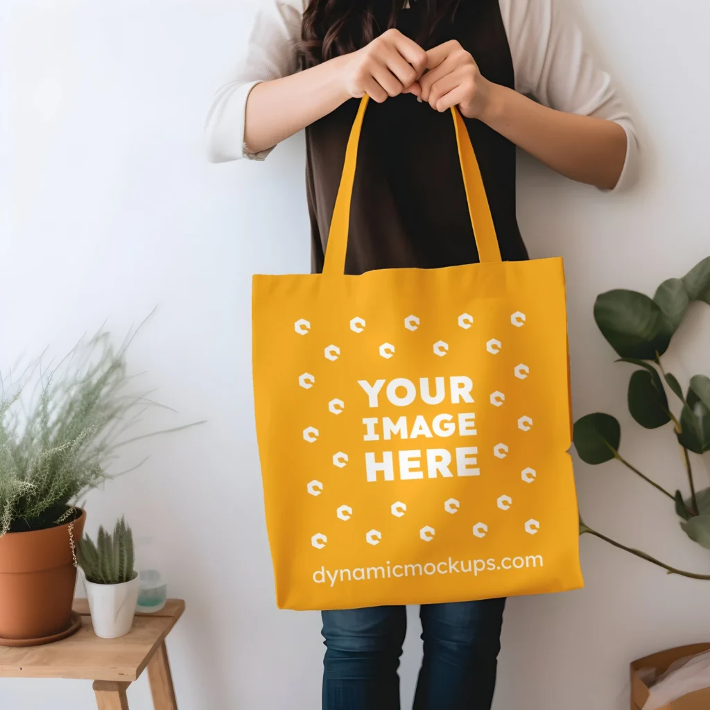 Woman Holding Orange Tote Bag Mockup Front View Template