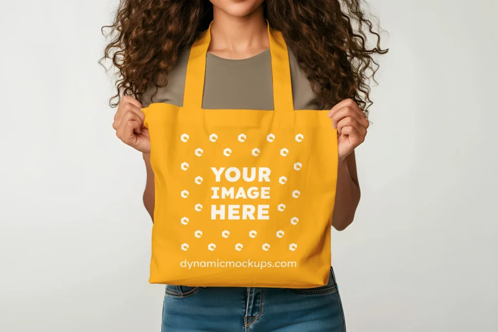 Woman Holding Orange Tote Bag Mockup Front View Template