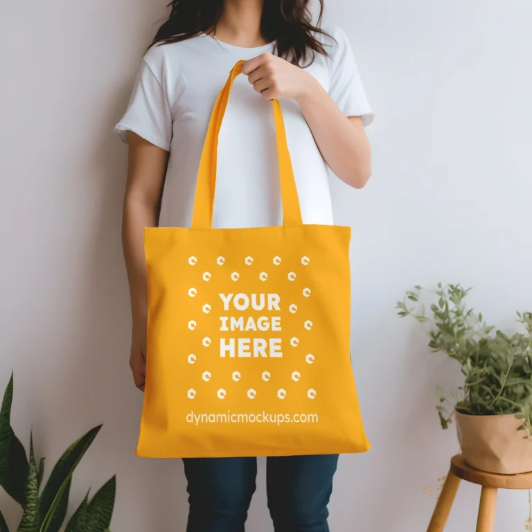 Woman Holding Orange Tote Bag Mockup Front View Template