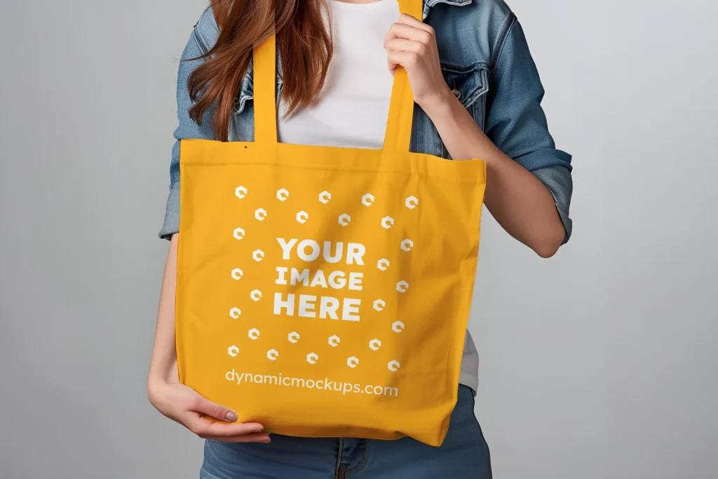 Woman Holding Orange Tote Bag Mockup Front View Template