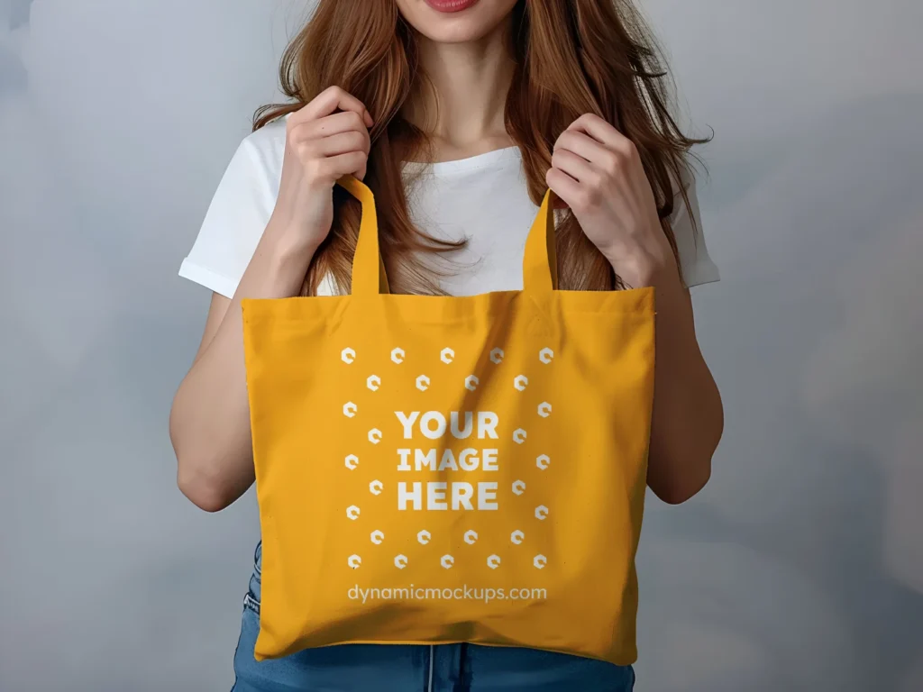 Woman Holding Orange Tote Bag Mockup Front View Template