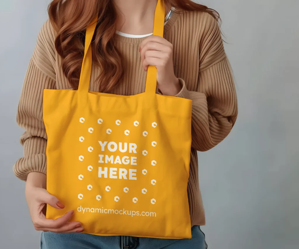 Woman Holding Orange Tote Bag Mockup Front View Template